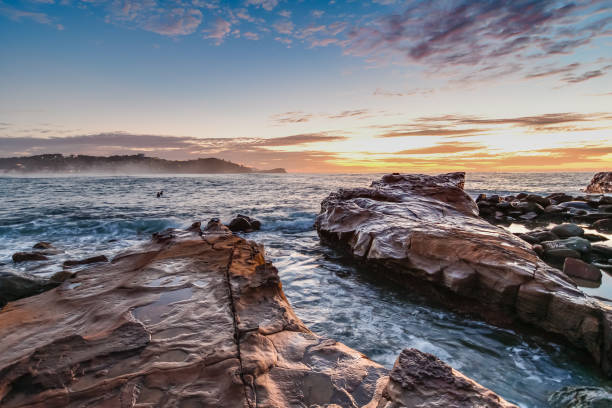 istock Rocky Sunrise Seascape 814099244