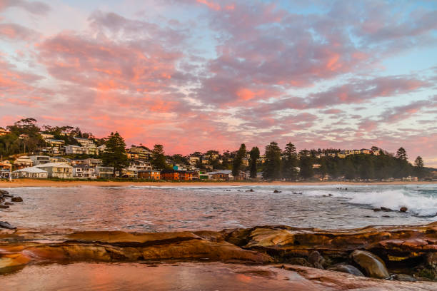Reverse Pink Sunrise at Avoca Beach Taken at Avoca Beach, Central Coast, NSW, Australia avoca beach photos stock pictures, royalty-free photos & images