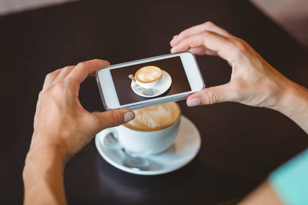 istock Woman taking picture with her smartphone 814101822