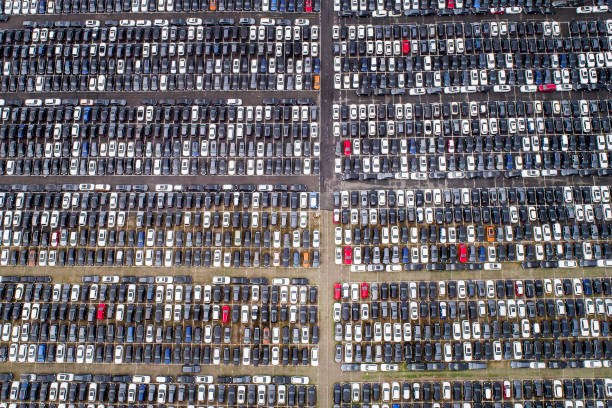 Large parking lot - aerial view. Large group of unrecognisable cars