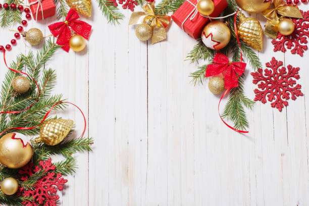 istock Christmas decoration on white wooden background 814127586