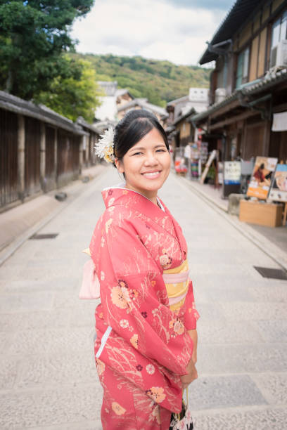 istock asian woman wearing red kimono 814128204