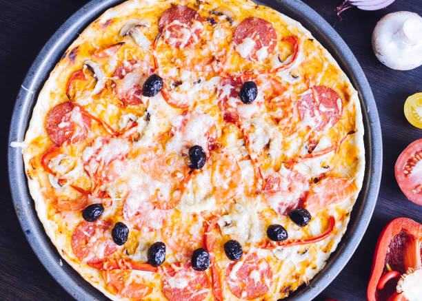 istock Hot true pepperoni italian pizza with salami and cheese 814140972