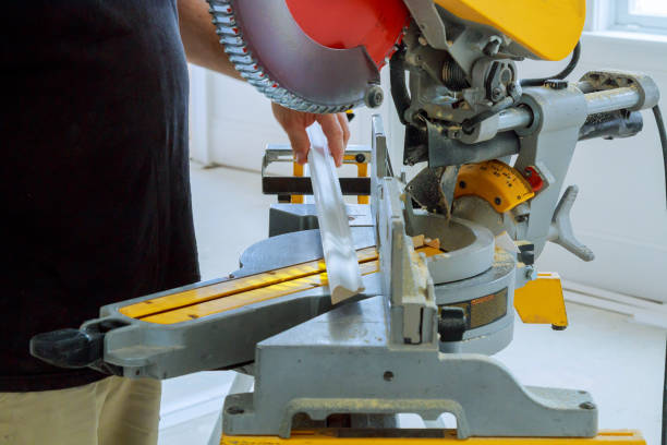 istock Contractor Using Circular Saw Cutting Crown Moulding for Renovation. 814155576