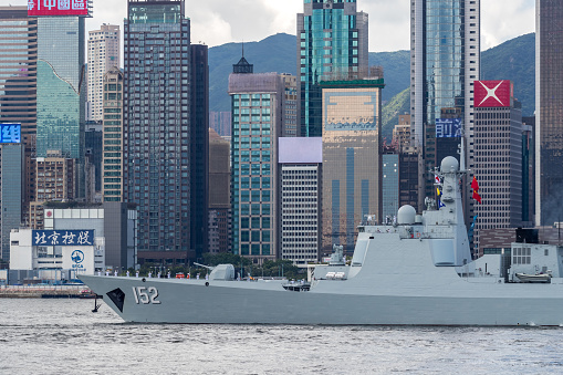 Jinan (number 152) missile destroyer acrossed Victoria harbour of Hong Kong returning naval base in mainland of China.Victoria Harbour, Hong Kong  - June 11, 2017 : Jinan (number 152) missile destroyer acrossed Victoria harbour of Hong Kong returning naval base in mainland of China.