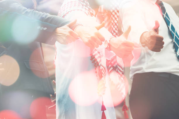istock Double exposure of hands group concept of teamwork and bokeh background 814167394