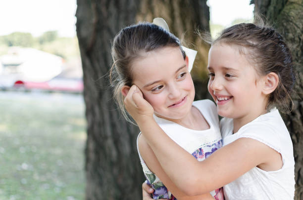 istock best friends hugging outside 814170870