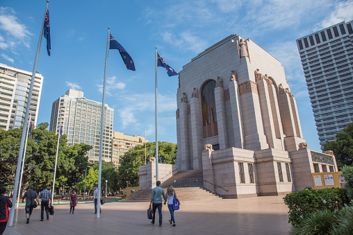 Sydney,NSW,Australia-November 18,2016: Anzac War Memorial building with Australian flags and people at Hyde Park in Sydney, Australia.