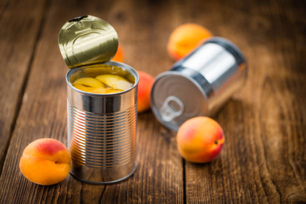 pickled apricots (selective focus) - canned food imagens e fotografias de stock