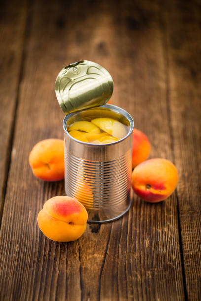 istock Pickled Apricots (selective focus) on vintage wooden background 814247366