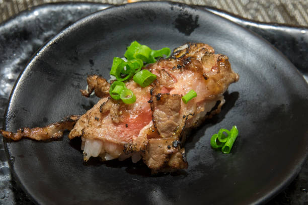 istock Japanese style grilled beef sushi 814265740