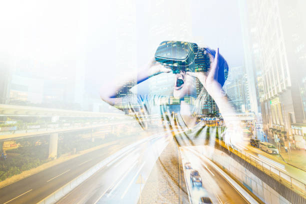 istock Double exposure of woman using the virtual reality headset 814266362