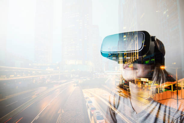istock Double exposure of woman using the virtual reality headset 814268522