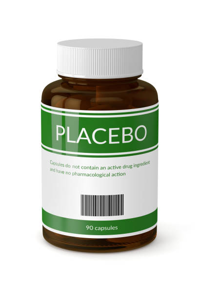 istock 3D render of bottle with placebo pills over white 814298756
