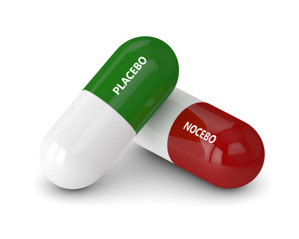 3d-render-of-placebo-and-nocebo-pills-over-white.jpg