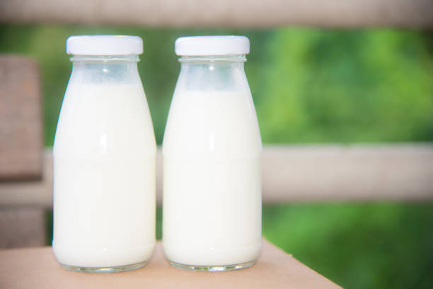 istock bottle of milk on white background. 814304520