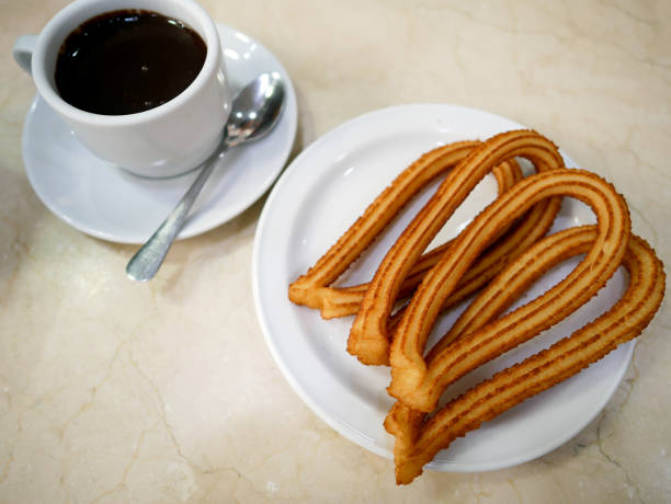 istock Churros or Spanish fried-dough pastry 814307222