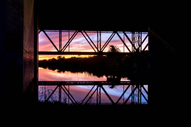 istock River reflections with a bridge and beams in San Diego 814307894