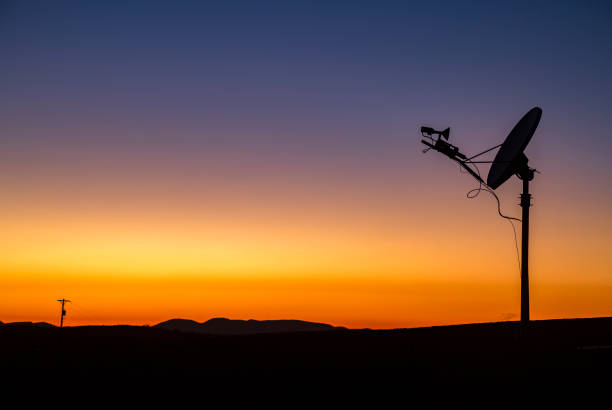 istock Sunset views of a satellite dish on the horizon 814316666