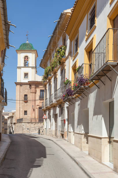 Street in Lorca, Spain Typical street in the historic town of Lorca. Province of Murcia, Spain lorca stock pictures, royalty-free photos & images