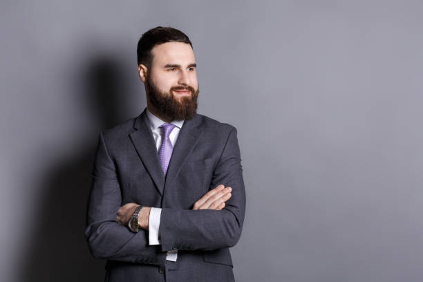istock Handsome confident bearded businessman portrait 814319732