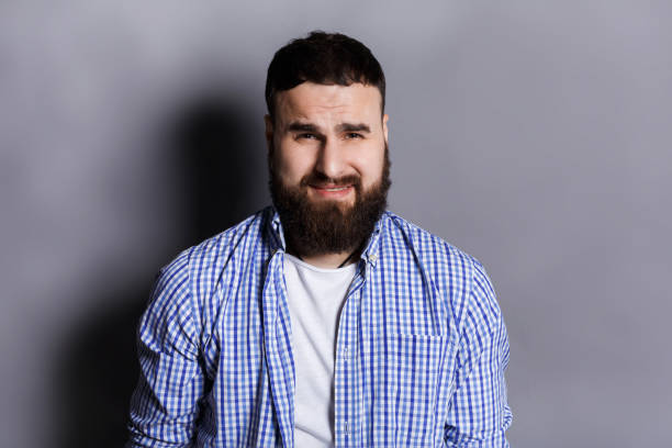 istock Feeling upset, sad bearded man portrait 814319808