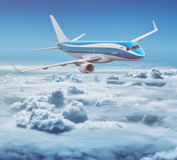 istock Airplane Embraer 190 flying above the clouds 814335014