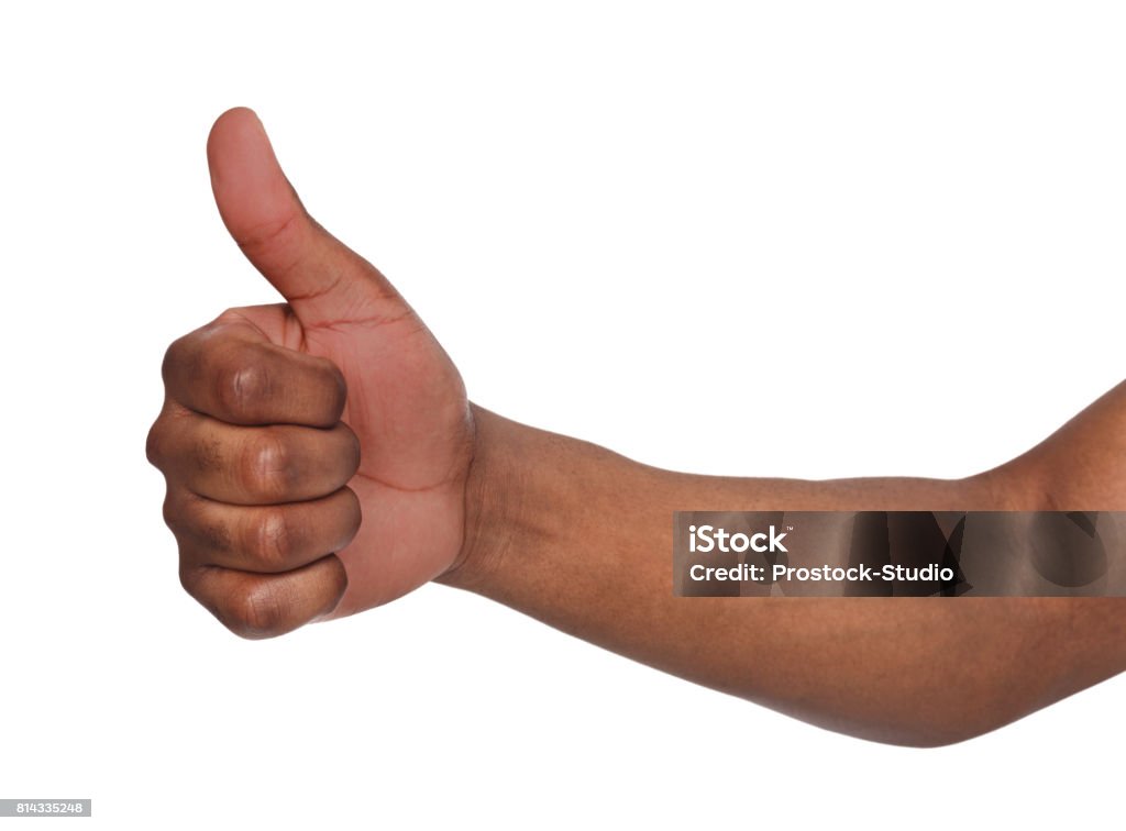 African american hand making thumb up gesture African american hand making thumb up gesture. Close-up of positive sign, like, agreement concept Thumbs Up Stock Photo
