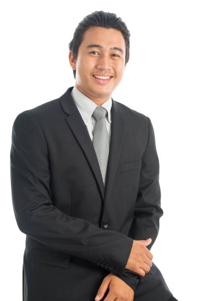 istock Asian businessman seated on chair 814339236