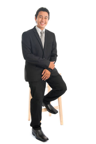 istock Asian businessman sitting on chair 814340128