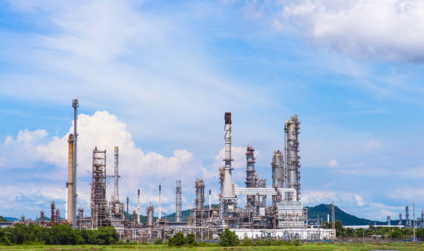 istock Oil purify plant with blue sky. 814343918