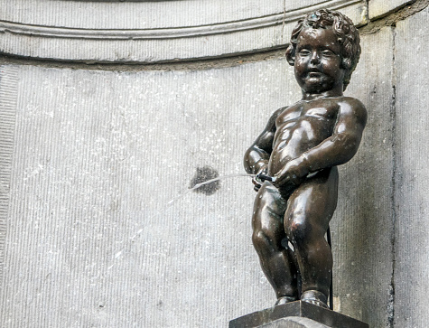 Dwarf Garden (Zwergerlgarten) - position 14 Dwarf with castanets - 17th century statue - Salzburg, Austria.