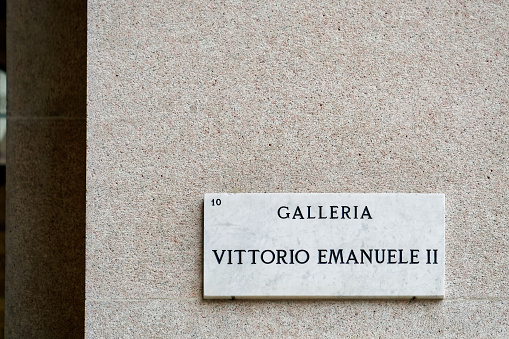 Milan, Italy - October 24, 2016: Galleria Vittorio Emanuele II Street sign in the wall, Milan, Italy
