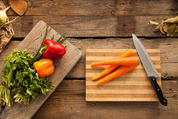 istock Vegetables prepared for cooking vegetarian food. Free space for text. 814353278