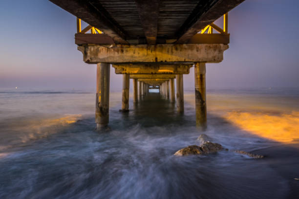 istock 6am sunrise at the pier 814357950