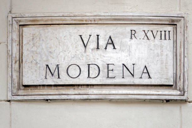 istock Via Modena street sign on wall in Rome 814358166