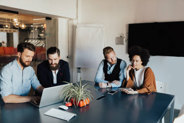 istock Coming together to determine their goals for the next project 814368800