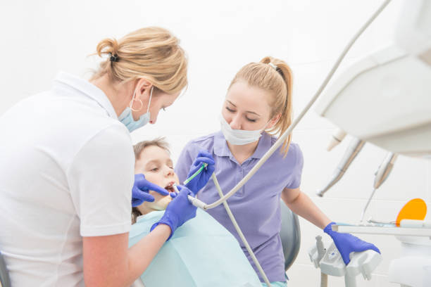 istock The boy heals teeth at the dentist 814386216