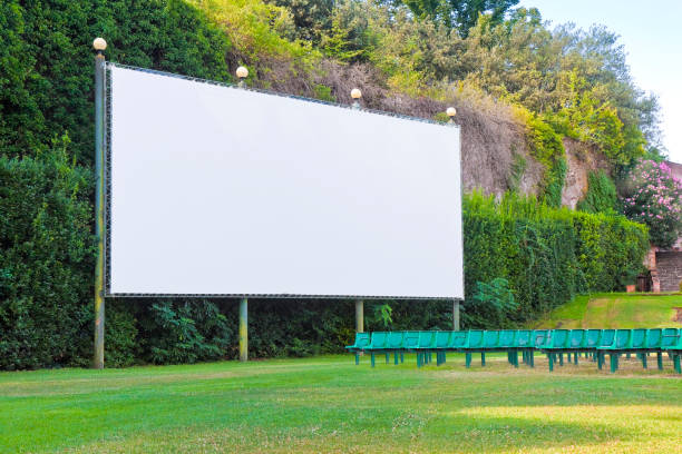 istock Outdoor cinema with white projection screen 814386356
