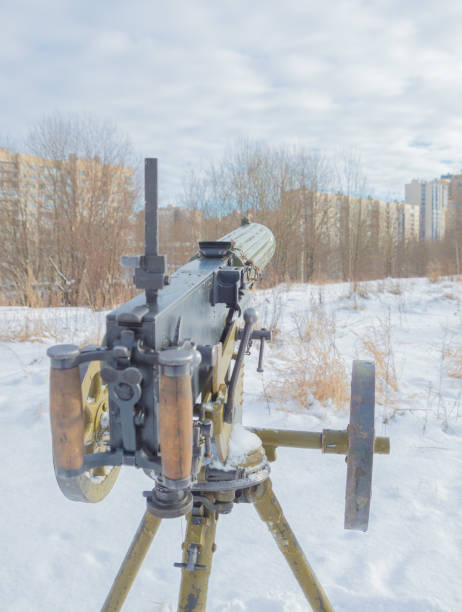 istock closeup, Maxine machine gun on a tripod in the snow 814389974