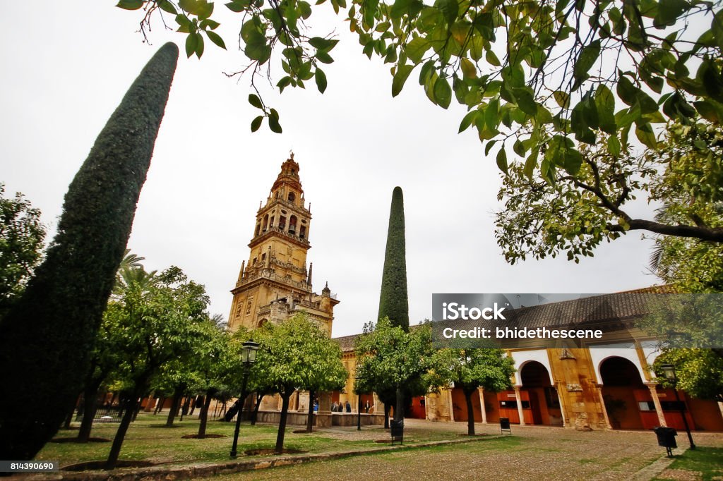 Bell tower from Court of Oranges in Mosque–Cathedral of Cordoba (Mezquita-Catedral de Córdoba), or Cathedral of Our Lady of the Assumption, in Historic centre of Cordoba, UNESCO World Heritage, Andalusia, Spain Cordoba - Spain Stock Photo