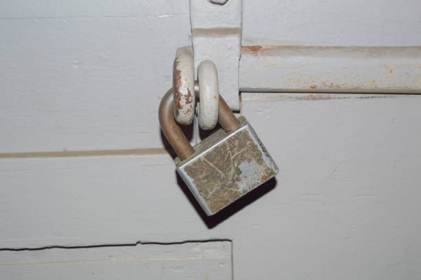 istock on the gates of the large lock with a deadbolt 814390752