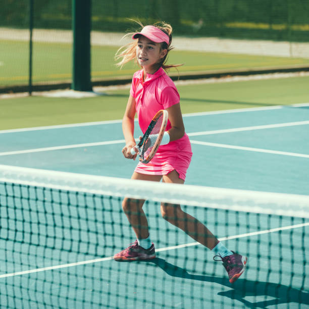 istock Junior tennis player in action 814393916