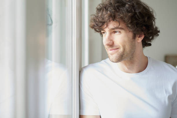 istock Laughing young man portrait 814394252