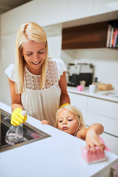 istock Keeping their home clean together 814398994