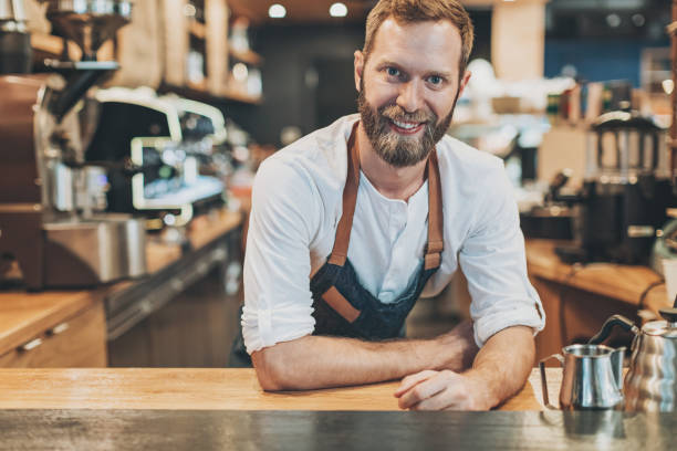 istock Close-up of a smiling bartender 814407990