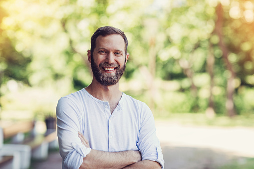 Portrait of a smiling man in the park