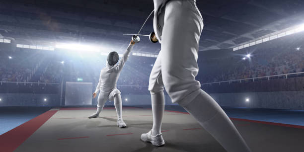 istock Female fencer fight on big professional stage 814409304