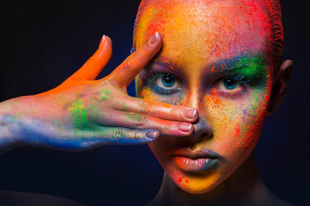 istock Model with colorful art make-up, close-up 814423808