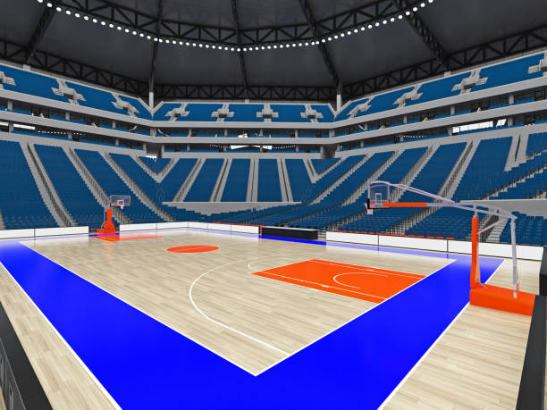istock Large modern basketball arena with blue seats 814434648